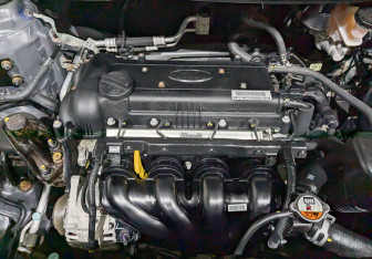 Подержанный автомобиль Kia Rio Sedan 2015 года (9 фото)