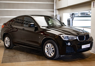 Подержанный автомобиль BMW X4 2015 года (3 фото)