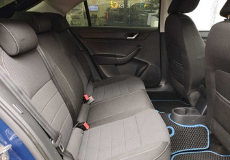 Подержанный автомобиль Skoda Rapid Liftback 2014 года (11 фото)