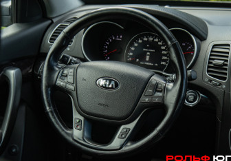 Подержанный автомобиль Kia Sorento 2013 года (11 фото)