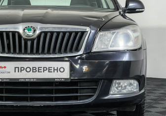 Подержанный автомобиль Skoda Octavia Liftback 2012 года (14 фото)