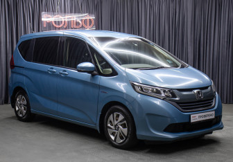 Подержанный автомобиль Honda Freed 2016 года (3 фото)