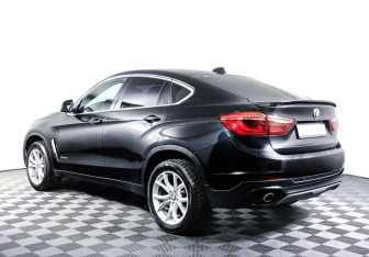 Подержанный автомобиль BMW X6 2015 года (7 фото)