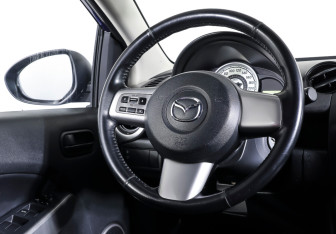 Подержанный автомобиль Mazda 2 Hatchback 2008 года (16 фото)
