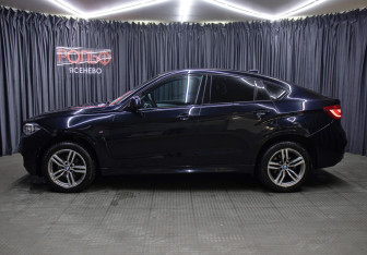 Подержанный автомобиль BMW X6 2017 года (8 фото)