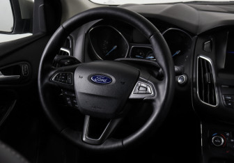 Подержанный автомобиль Ford Focus Sedan 2015 года (11 фото)