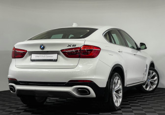 Подержанный автомобиль BMW X6 2015 года (2 фото)