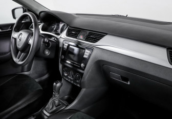 Подержанный автомобиль Skoda Rapid Liftback 2018 года (9 фото)