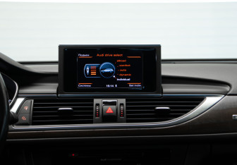 Подержанный автомобиль Audi A6 allroad 2014 года (25 фото)