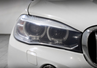 Подержанный автомобиль BMW X5 2015 года (17 фото)