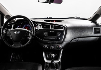 Подержанный автомобиль Kia Ceed Wagon 2014 года (9 фото)