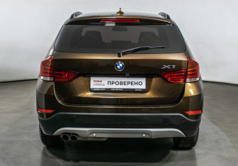 Подержанный автомобиль BMW X1 2014 года (6 фото)