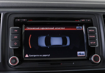 Подержанный автомобиль Volkswagen Multivan 2015 года (15 фото)