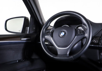 Подержанный автомобиль BMW X6 2013 года (17 фото)