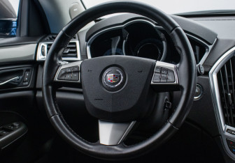 Подержанный автомобиль Cadillac SRX 2012 года (15 фото)