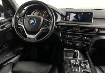 Подержанный автомобиль BMW X5 2014 года (15 фото)