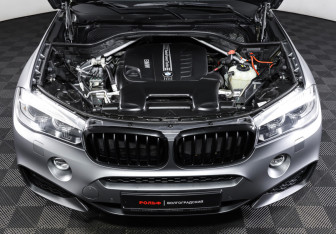 Подержанный автомобиль BMW X6 2018 года (9 фото)