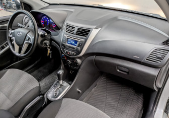 Подержанный автомобиль Hyundai Solaris Sedan 2013 года (11 фото)