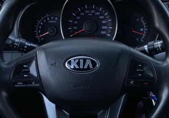 Подержанный автомобиль Kia Rio Sedan 2014 года (15 фото)