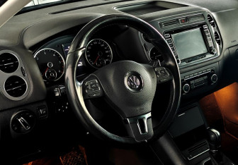 Подержанный автомобиль Volkswagen Tiguan 2011 года (12 фото)