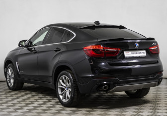Подержанный автомобиль BMW X6 2015 года (7 фото)