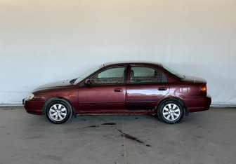 Подержанный автомобиль Kia Spectra Sedan 2006 года (7 фото)