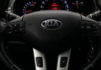 Подержанный автомобиль Kia Sportage 2012 года (15 фото)