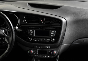 Подержанный автомобиль Kia Ceed Wagon 2013 года (12 фото)