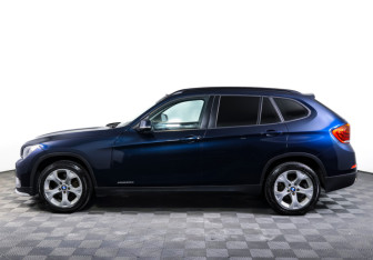 Подержанный автомобиль BMW X1 2014 года (8 фото)