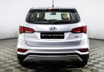 Подержанный автомобиль Hyundai Santa Fe 2016 года (4 фото)