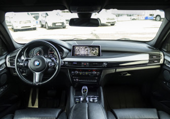 Подержанный автомобиль BMW X6 2018 года (15 фото)