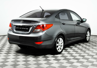 Подержанный автомобиль Hyundai Solaris Sedan 2013 года (3 фото)