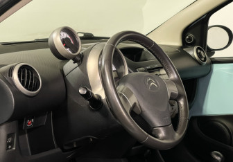 Подержанный автомобиль Citroen C1 2014 года (13 фото)
