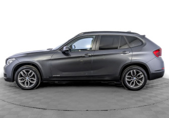 Подержанный автомобиль BMW X1 2014 года (8 фото)