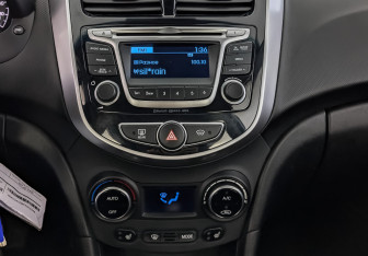 Подержанный автомобиль Hyundai Solaris Sedan 2014 года (17 фото)