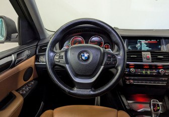 Подержанный автомобиль BMW X4 2015 года (21 фото)
