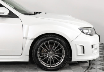 Подержанный автомобиль Subaru Impreza WRX Sedan 2011 года (13 фото)