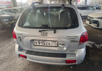 Подержанный автомобиль Hyundai Santa Fe 2011 года (5 фото)