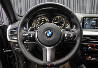 Подержанный автомобиль BMW X6 2017 года (17 фото)