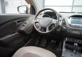 Подержанный автомобиль Hyundai ix35 2014 года (13 фото)