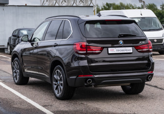 Подержанный автомобиль BMW X5 2014 года (7 фото)
