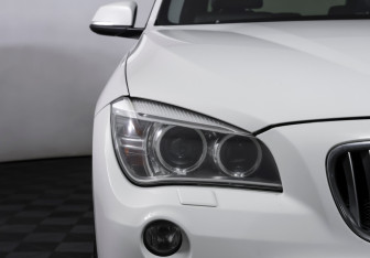 Подержанный автомобиль BMW X1 2013 года (23 фото)