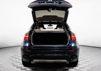 Подержанный автомобиль BMW X6 2013 года (14 фото)