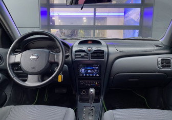 Подержанный автомобиль Nissan Almera Classic 2006 года (11 фото)