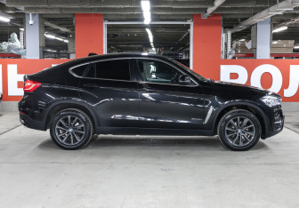 Подержанный автомобиль BMW X6 2015 года (4 фото)