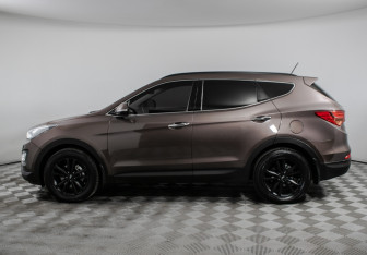 Подержанный автомобиль Hyundai Santa Fe 2015 года (8 фото)