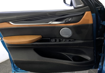 Подержанный автомобиль BMW X6 M 2016 года (19 фото)