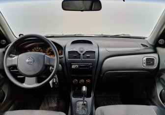 Подержанный автомобиль Nissan Almera Classic 2012 года (14 фото)
