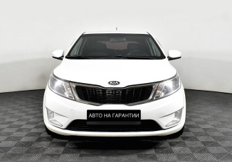 Подержанный автомобиль Kia Rio Hatchback 2013 года (2 фото)