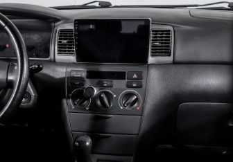 Подержанный автомобиль Toyota Corolla Sedan 2004 года (13 фото)